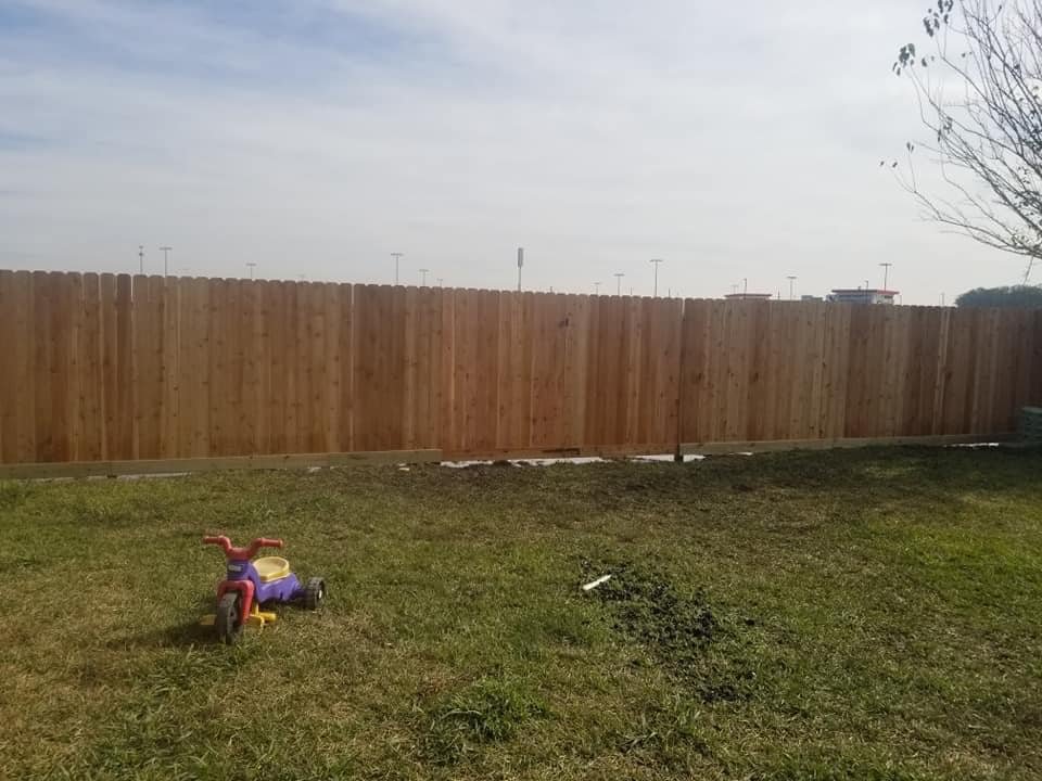 finished cedar fence job